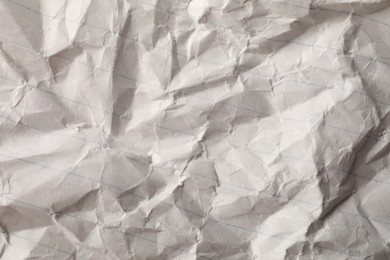 Crumpled sheet of paper as background, top view