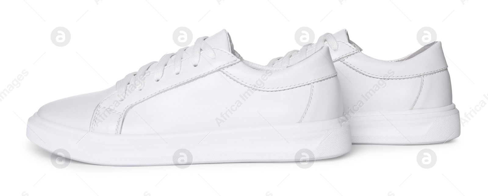 Photo of Pair of stylish sneakers isolated on white