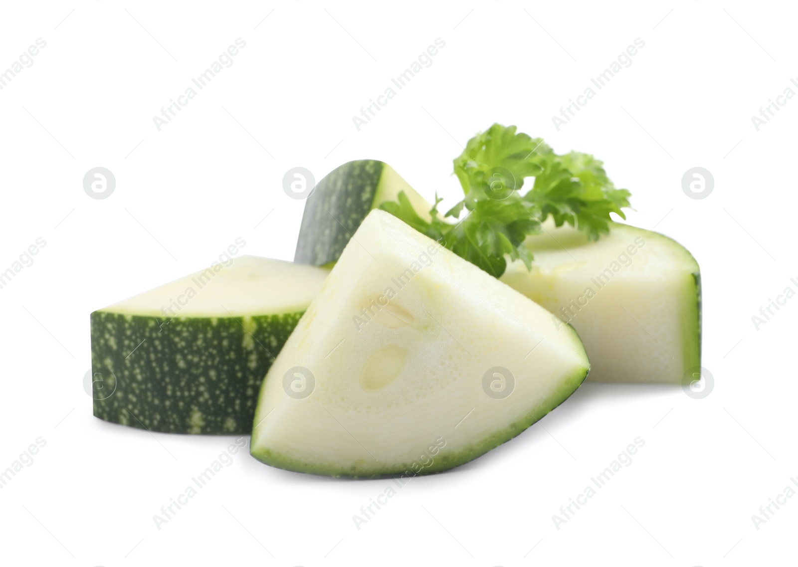 Photo of Cut green ripe zucchini and parsley isolated on white