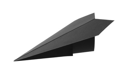 Photo of Handmade black paper plane isolated on white