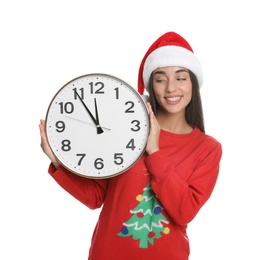 Photo of Woman in Santa hat with clock on white background. New Year countdown