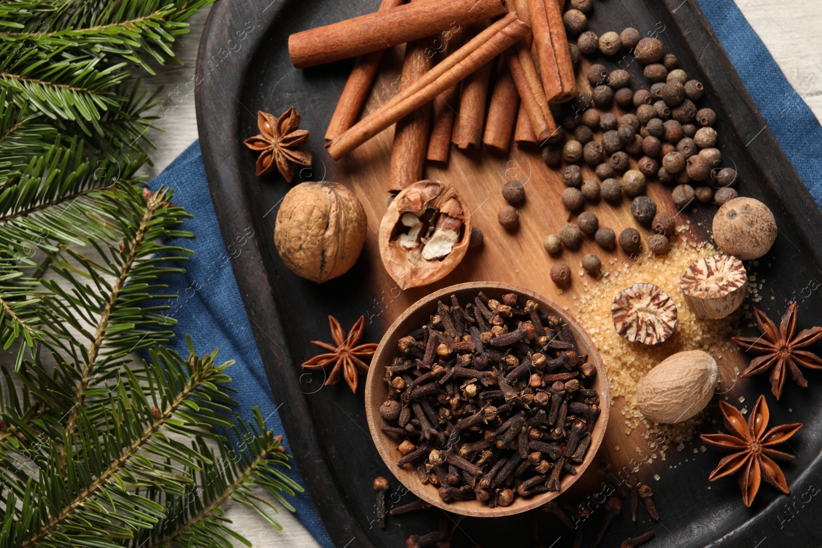 Photo of Different spices and nuts on table, flat lay