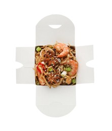 Photo of Box of wok noodles with seafood isolated on white, top view