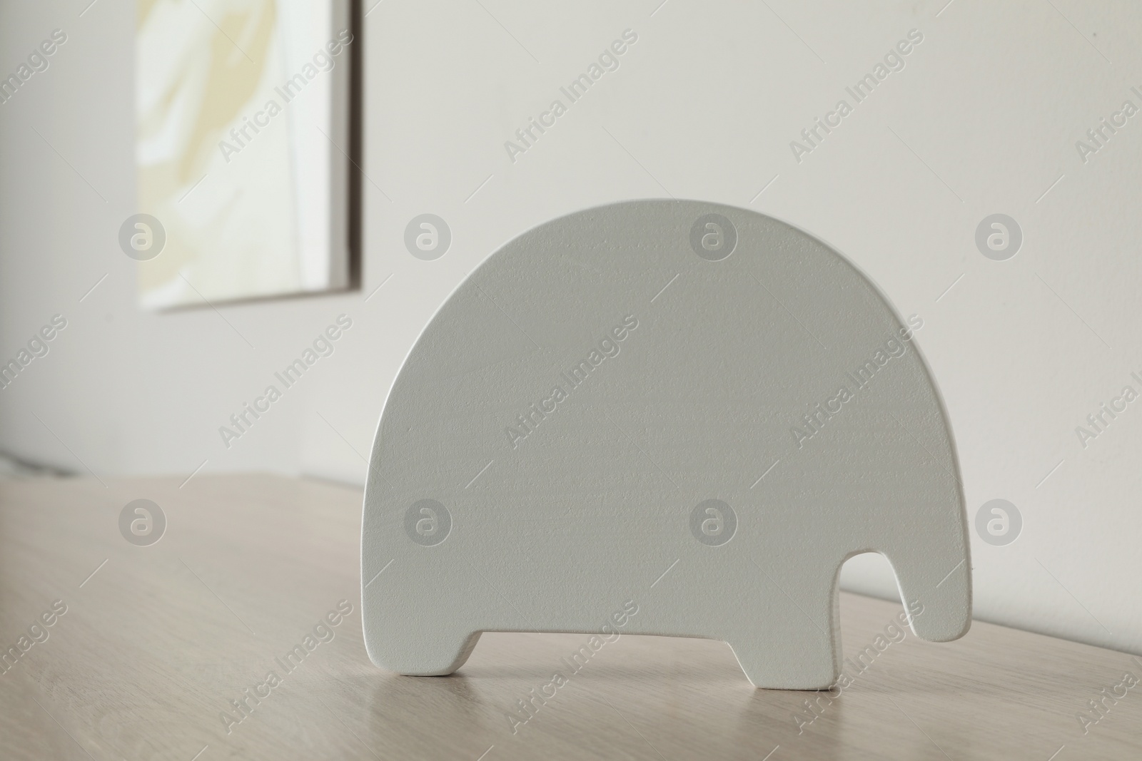 Photo of Night lamp on wooden table in child's room