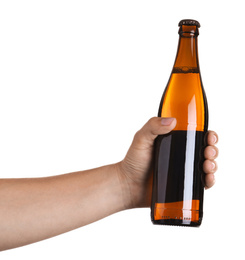 Photo of Man holding brown bottle with beer on white background, closeup
