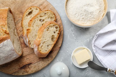 Photo of Flat lay composition with freshly baked sodawater bread on light grey marble table