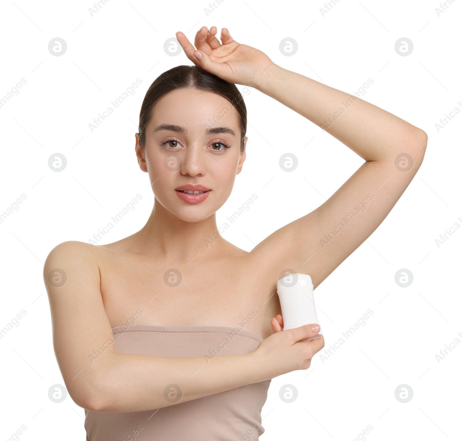 Photo of Beautiful woman applying deodorant on white background