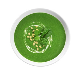 Dish with spinach cream soup on white background, top view. Healthy food