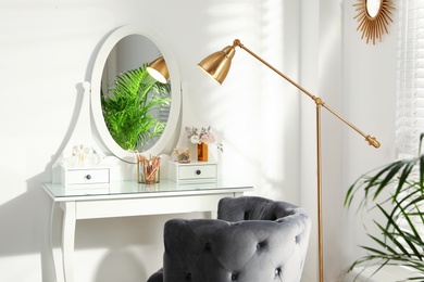 Stylish room interior with elegant dressing table