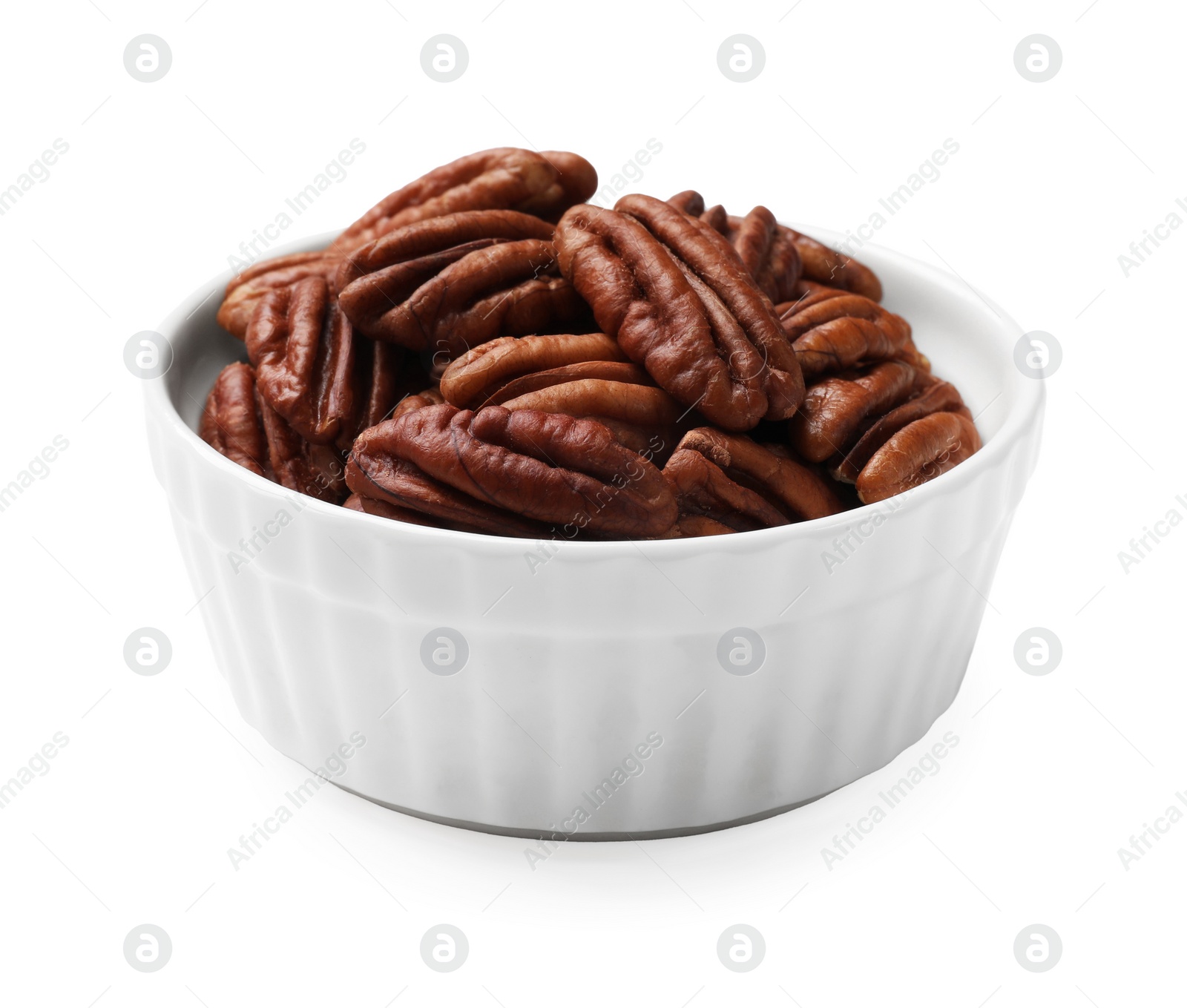 Photo of Tasty pecan nuts in bowl isolated on white