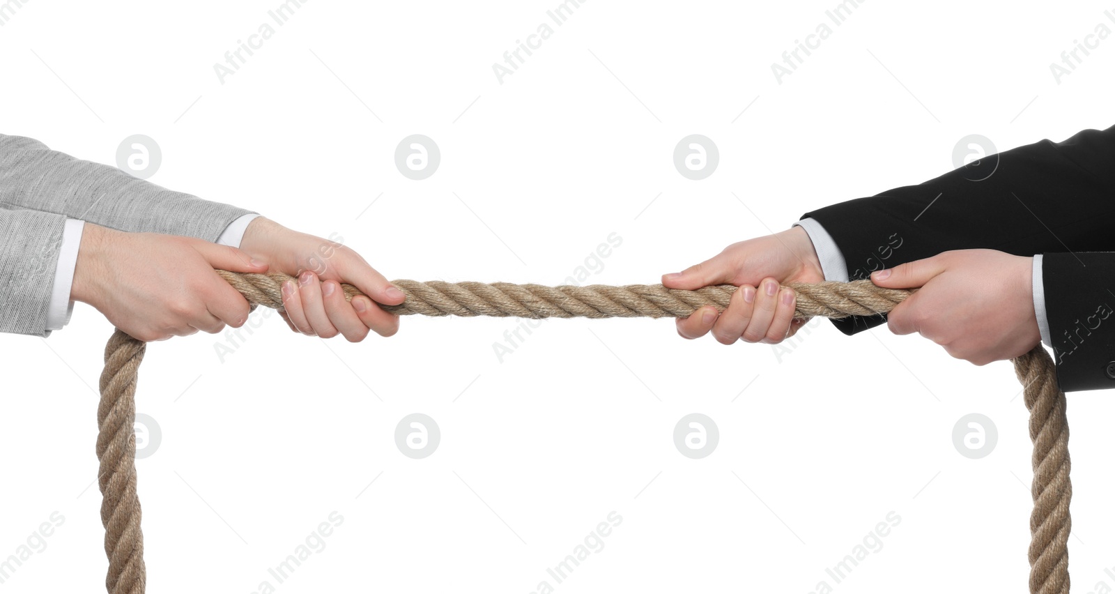 Photo of Dispute concept. Men pulling rope on white background, closeup