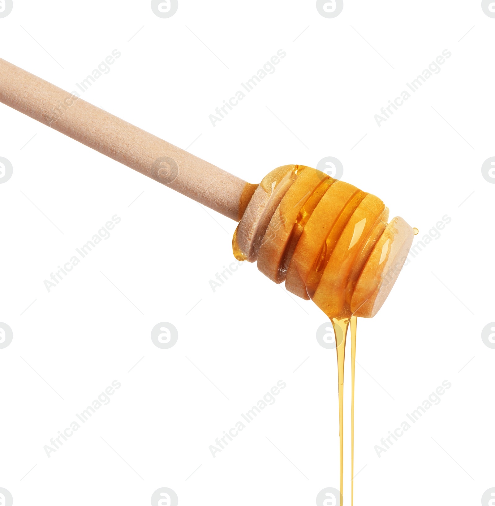 Photo of Fresh honey dripping from dipper on white background