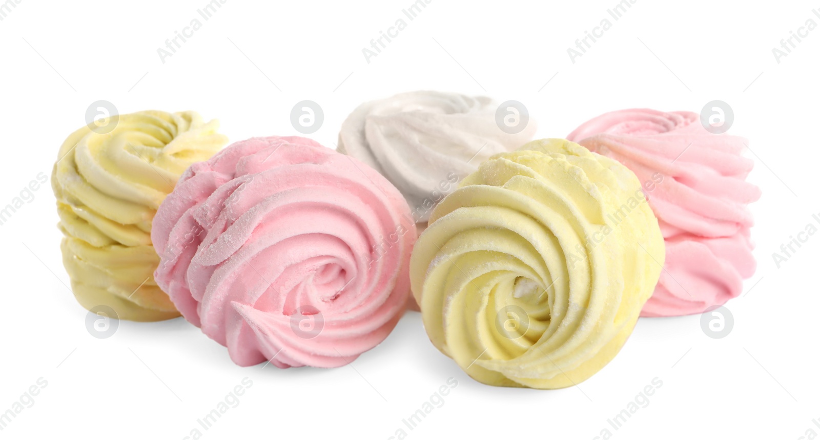 Photo of Many different delicious zephyrs on white background