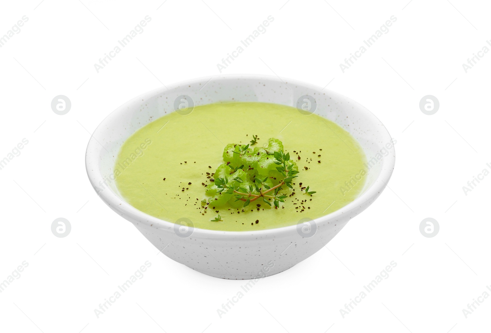 Photo of Bowl of delicious celery soup isolated on white