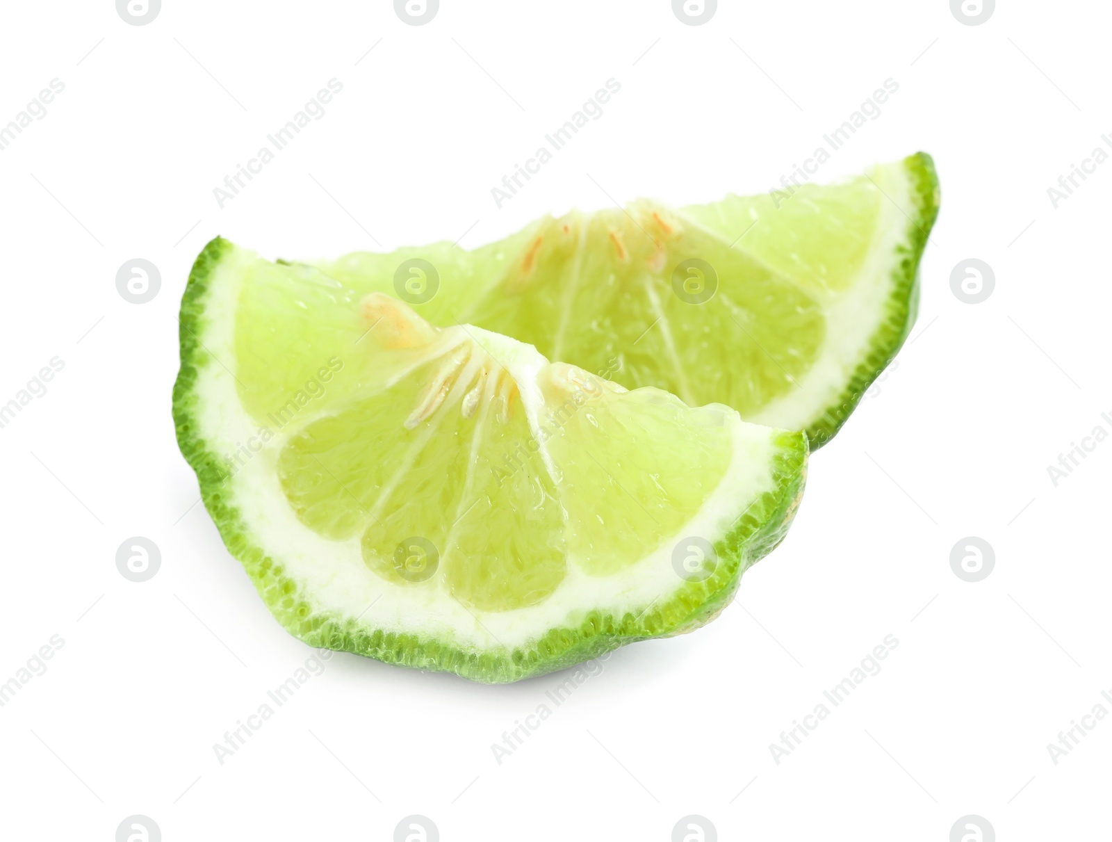 Photo of Slices of fresh ripe bergamot fruit on white background