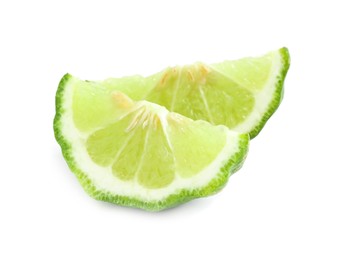 Photo of Slices of fresh ripe bergamot fruit on white background
