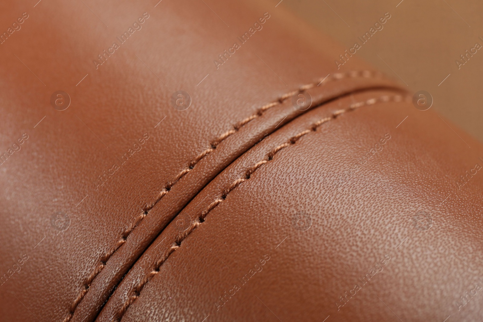 Photo of Texture of brown leather as background, closeup