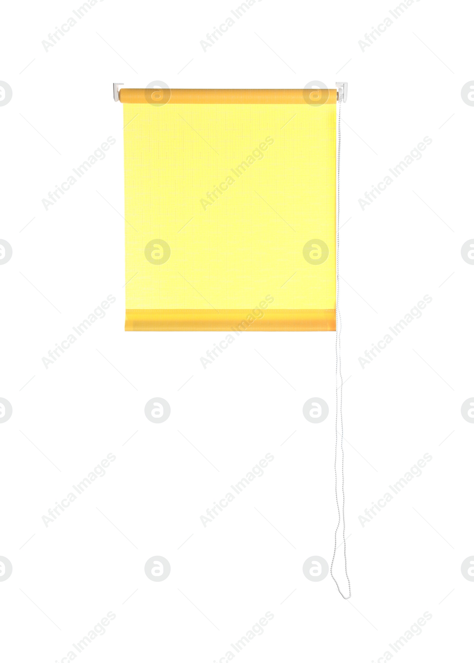 Photo of Yellow window roller blind isolated on white