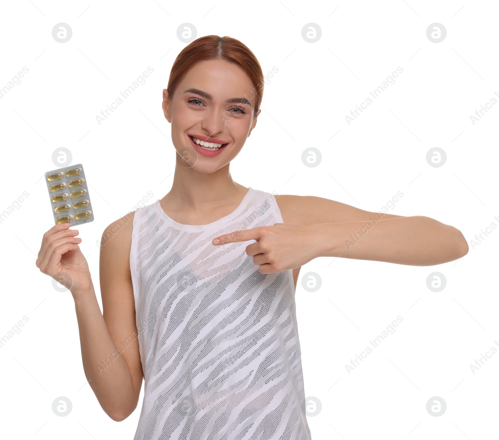 Photo of Happy young woman with pills on white background. Weight loss