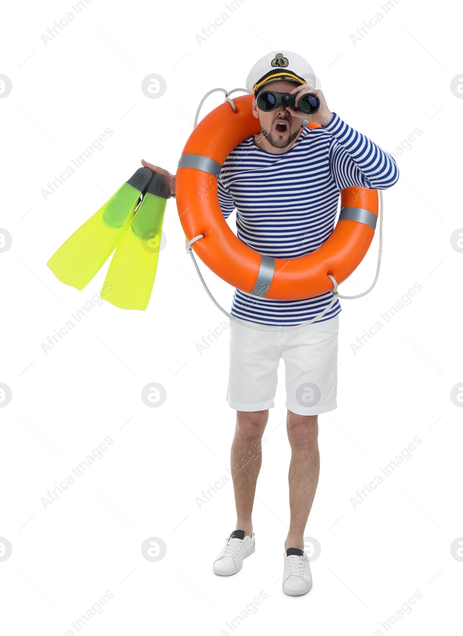Photo of Sailor with ring buoy and swim fins looking through binoculars on white background