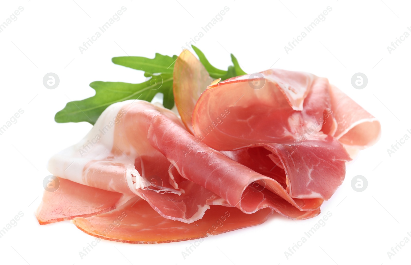 Photo of Slices of tasty prosciutto on white background