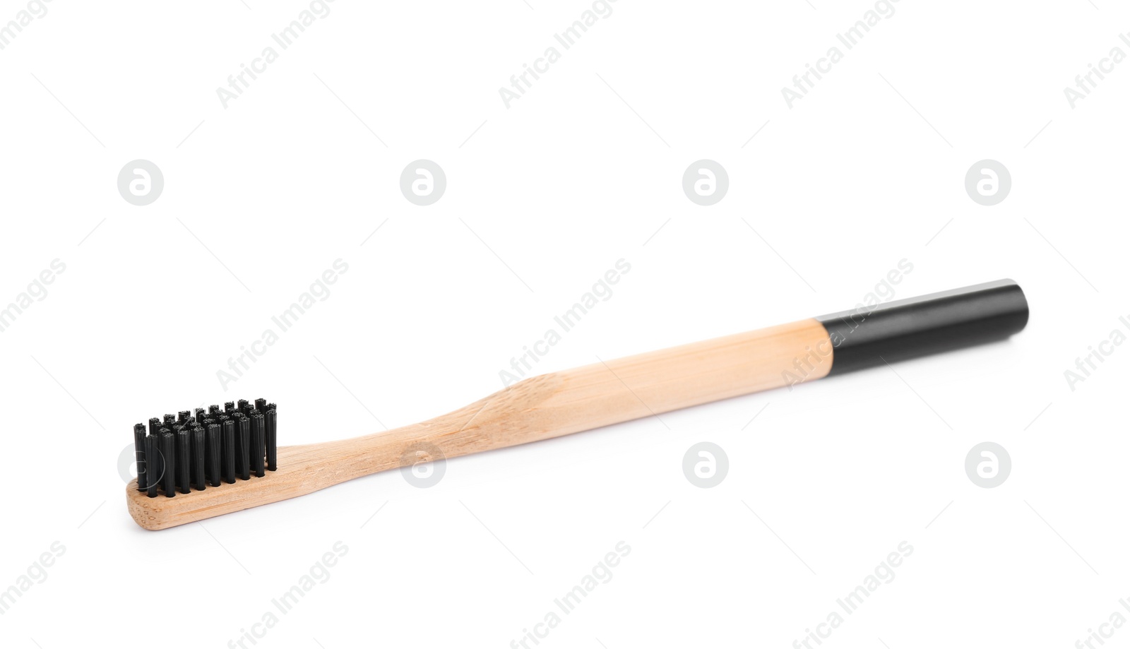 Photo of Bamboo toothbrush with charcoal bristle isolated on white