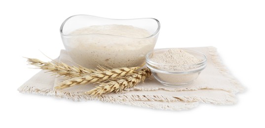 Photo of Leaven and ears of wheat isolated on white