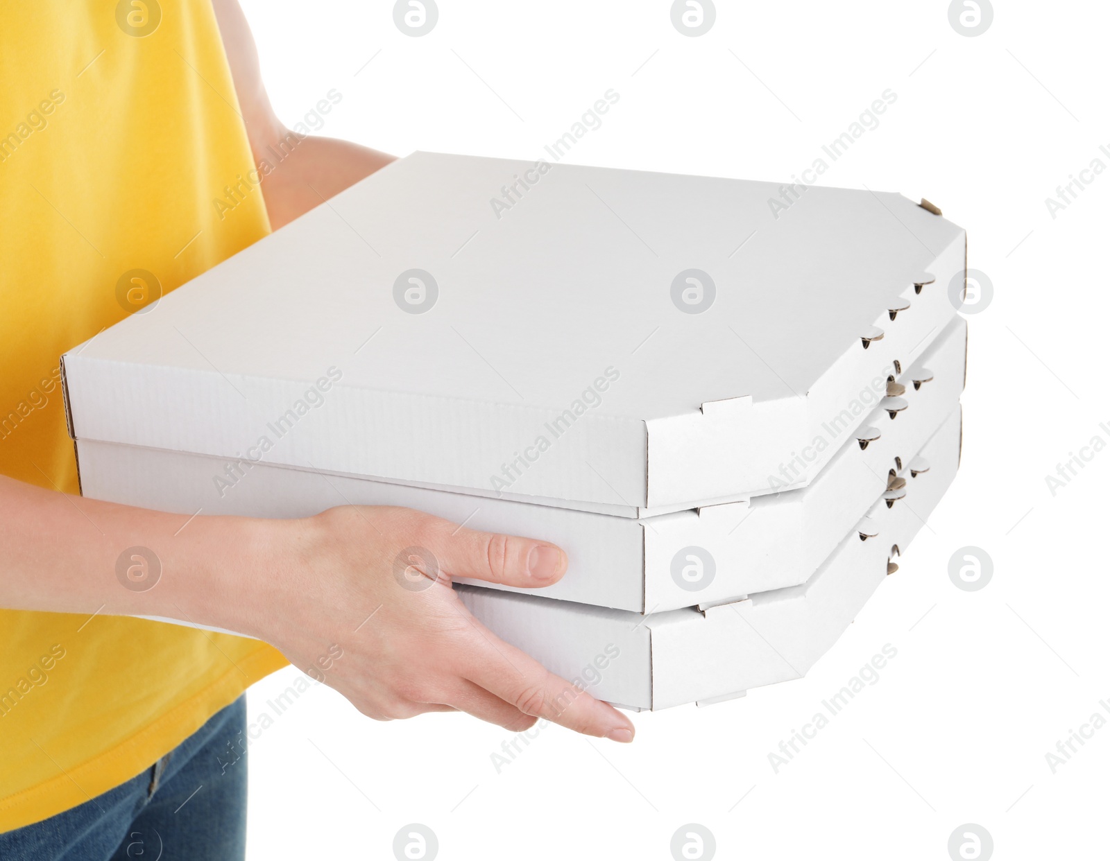 Photo of Woman holding cardboard pizza boxes on white background