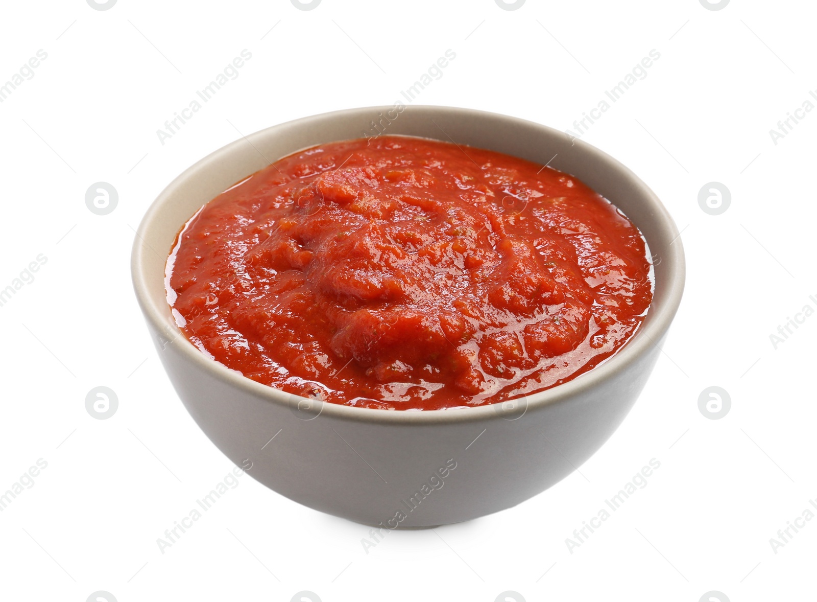 Photo of Homemade tomato sauce in bowl isolated on white