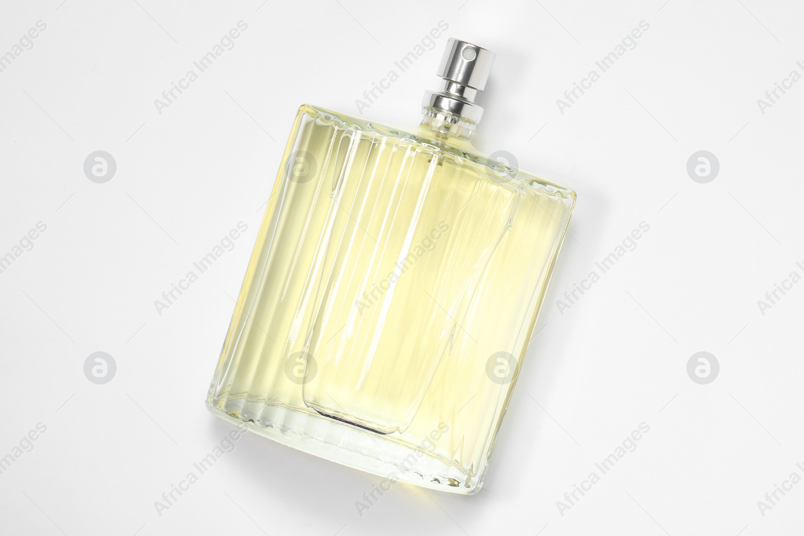 Photo of Luxury men`s perfume in bottle on white background, top view