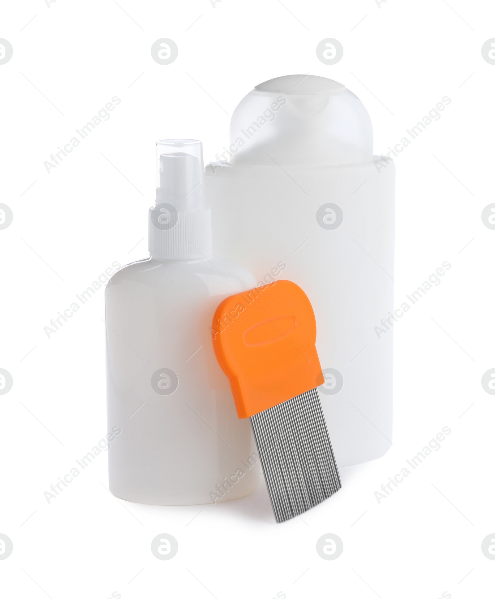 Photo of Products for anti lice treatment and metal comb on white background