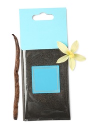 Photo of Scented sachet, vanilla stick and flower on white background, top view