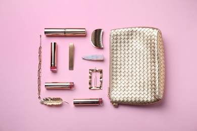 Photo of Flat lay composition with cosmetic products and accessories on pink background