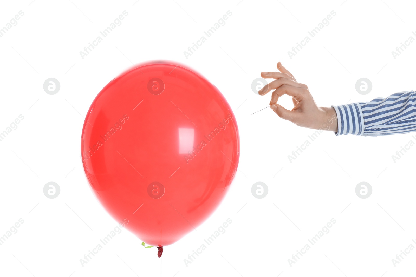 Photo of Woman piercing red balloon on white background, closeup