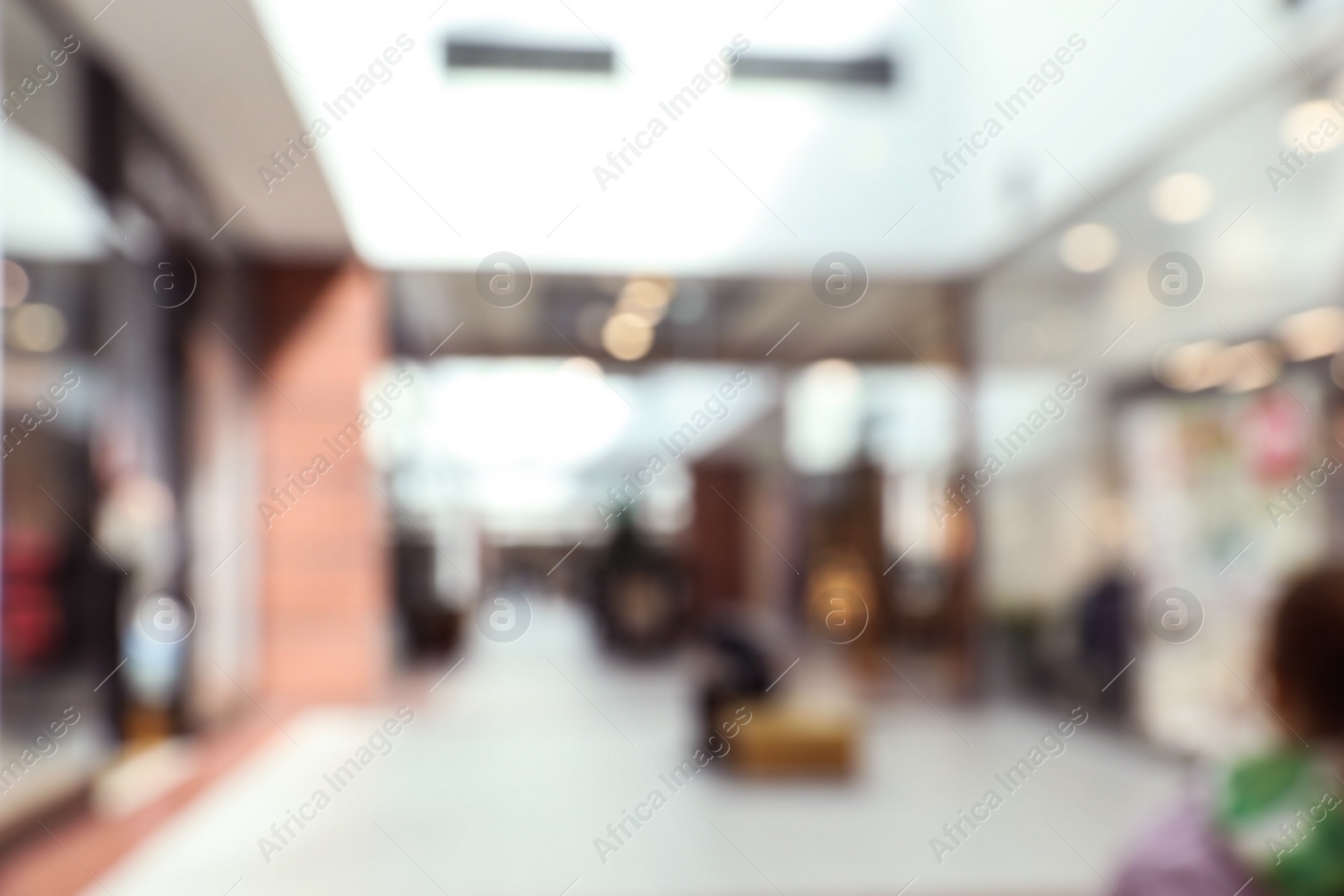 Photo of Blurred view of shopping mall interior. Bokeh effect