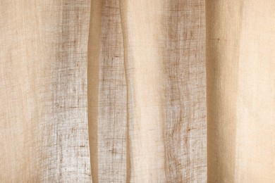 Texture of natural burlap fabric as background, closeup