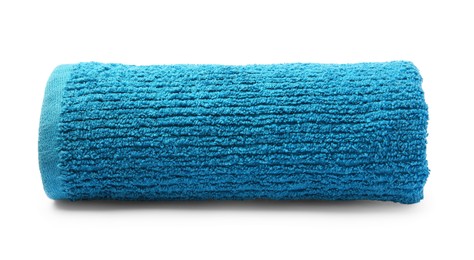 Photo of Rolled blue terry towel isolated on white