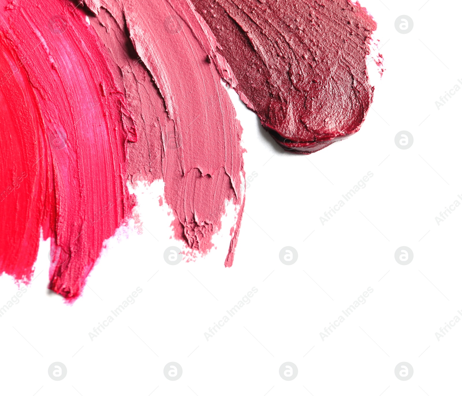 Photo of Lipstick smears isolated on white. Space for text