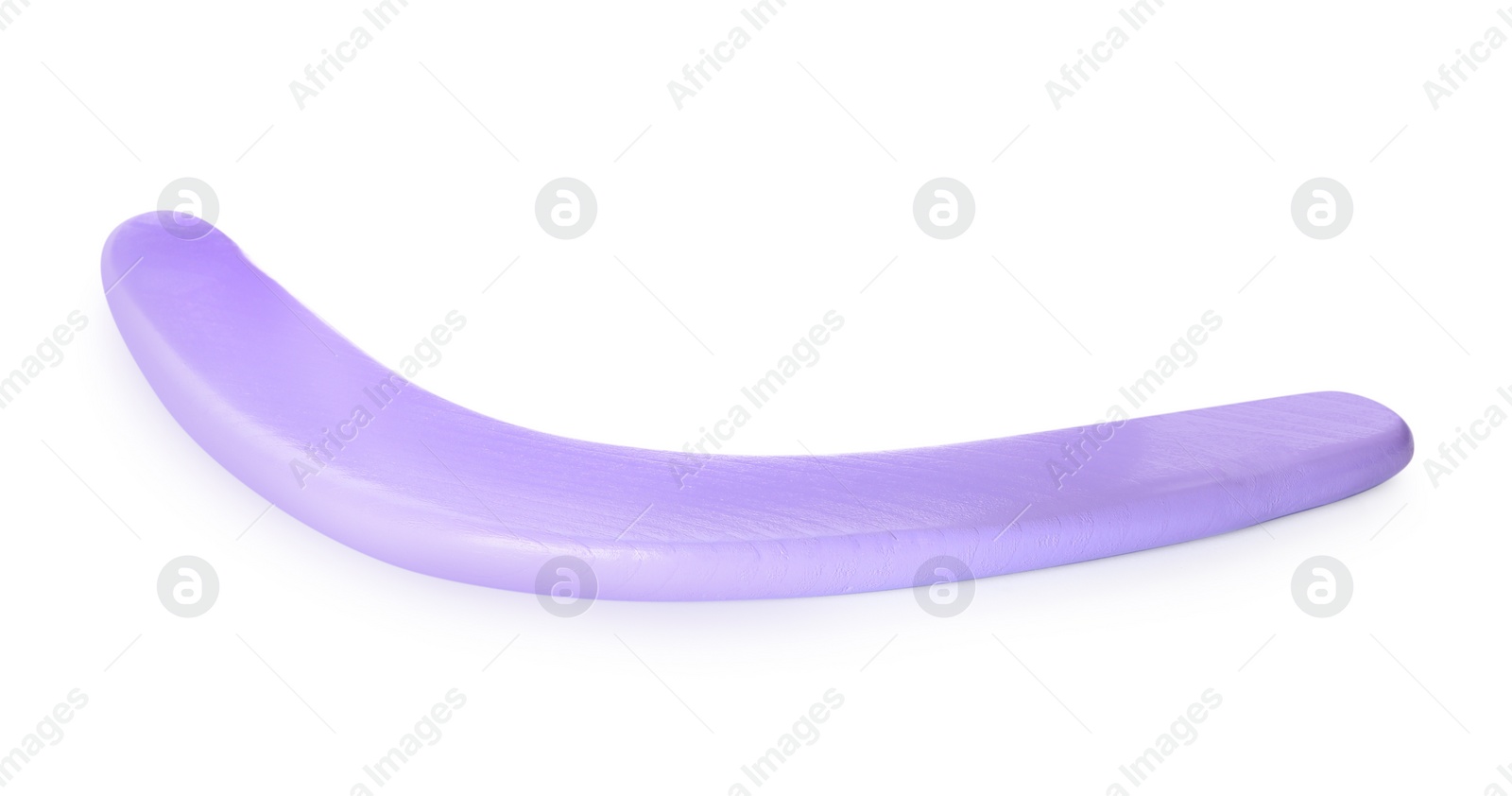 Photo of Purple boomerang isolated on white. Outdoors activity