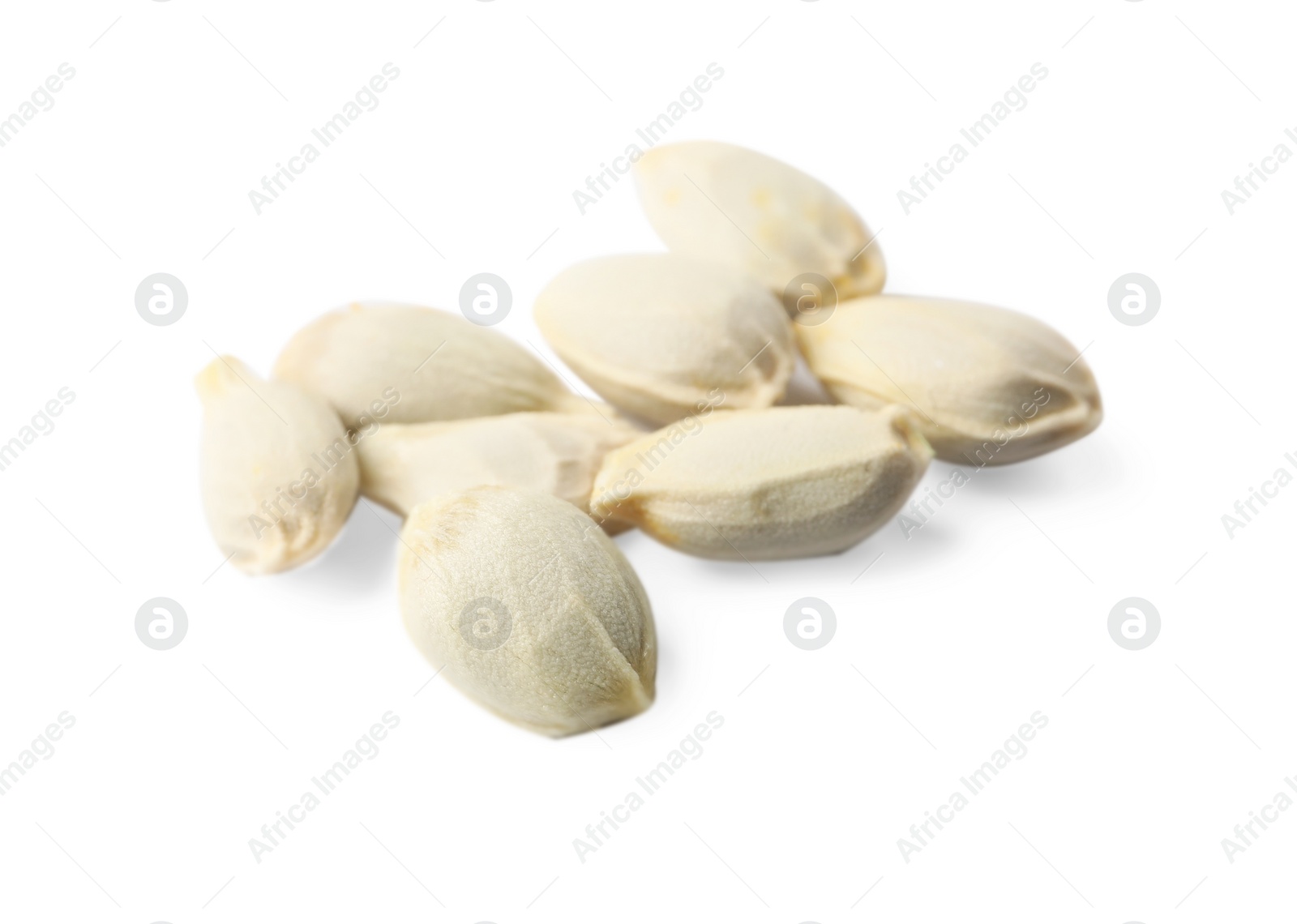 Photo of Many seeds of tangerine isolated on white