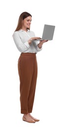 Beautiful businesswoman with laptop on white background