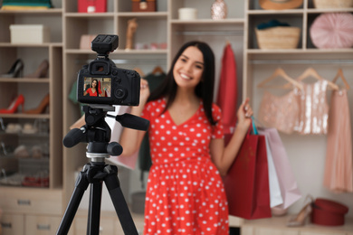 Fashion blogger recording new video in room