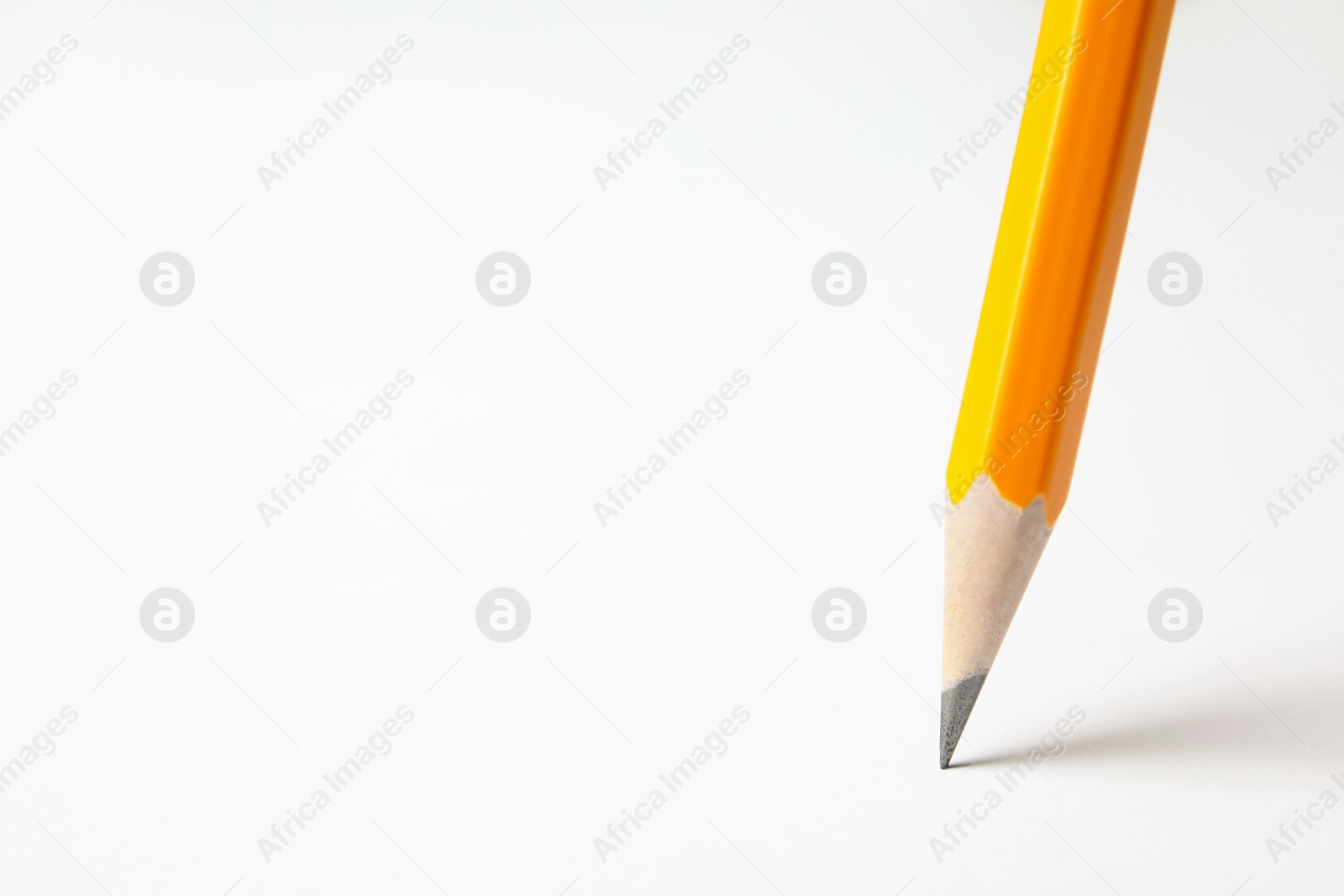 Photo of Sharp pencil drawing line on white paper, closeup