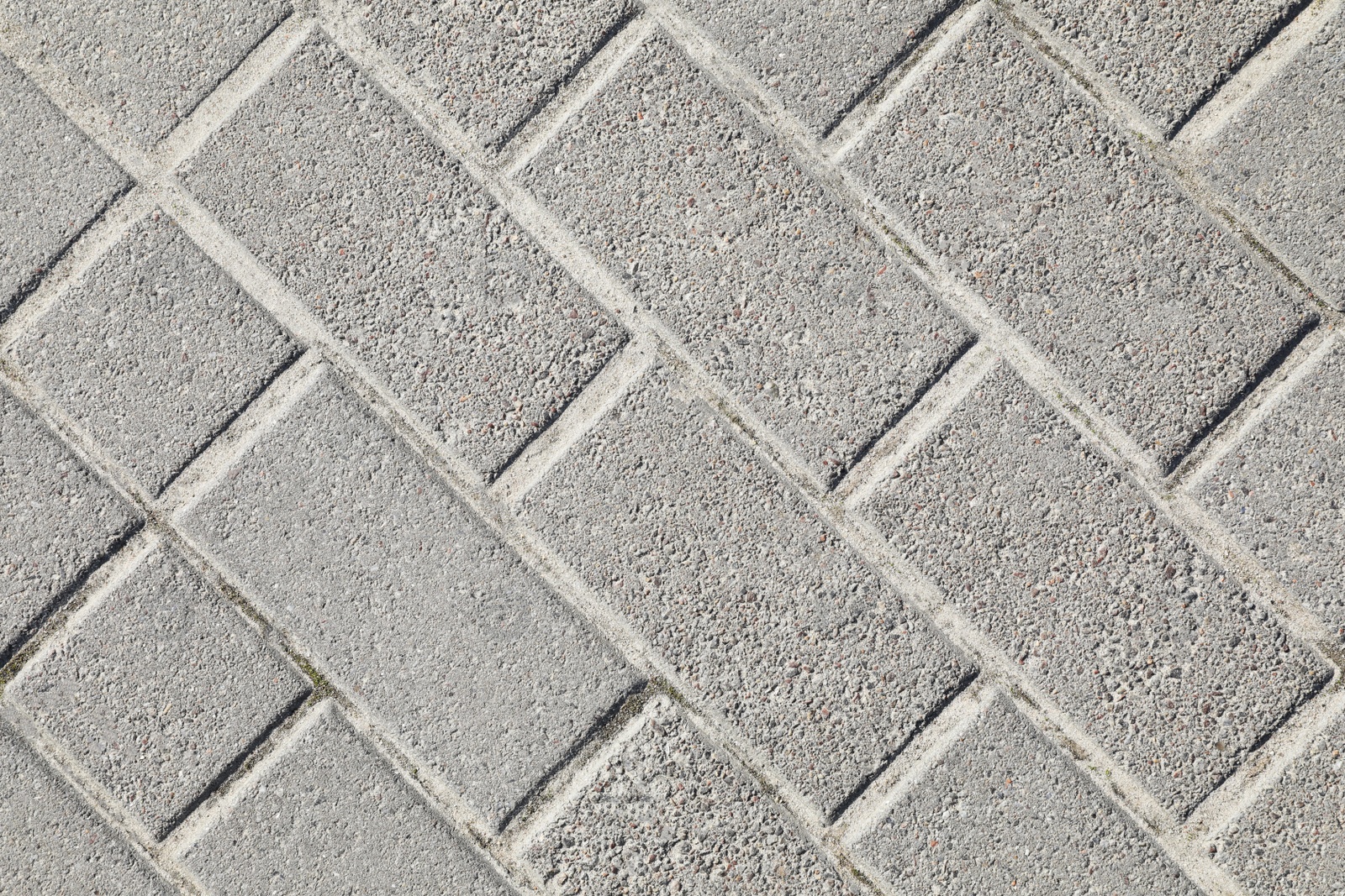 Photo of Pavement with grey tiles as background, top view