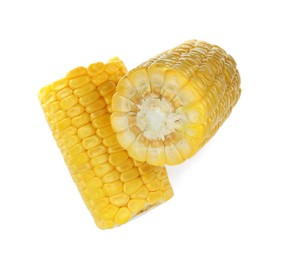 Photo of Pieces of corncobs on white background, top view