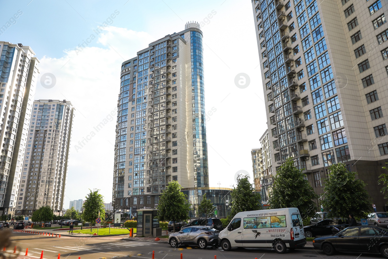 Photo of KYIV, UKRAINE - MAY 21, 2019: Beautiful view of modern housing estate in Pecherskyi district on sunny day