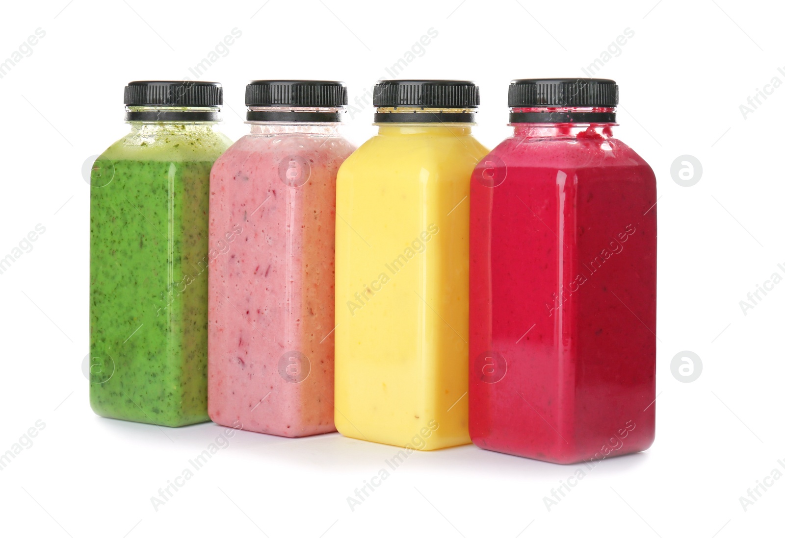 Photo of Bottles with delicious detox smoothies on white background