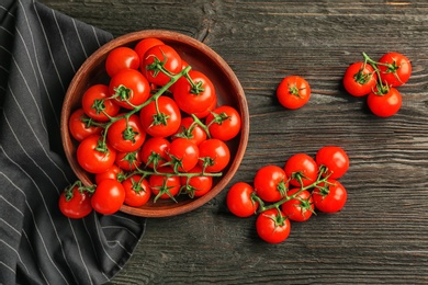 Photo of Flat lay composition with ripe tomatoes on wooden background