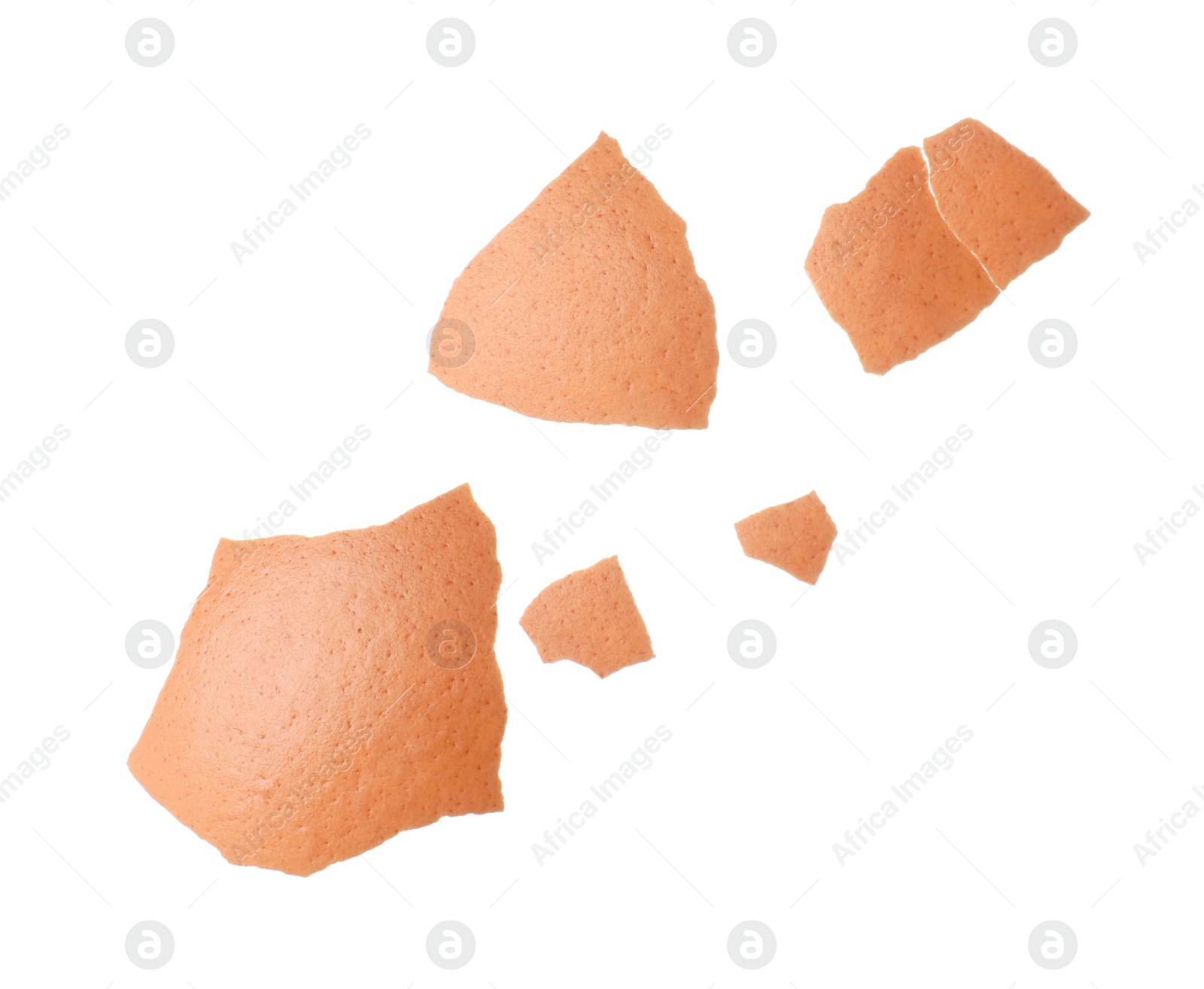 Photo of Pieces of shell egg isolated on white background