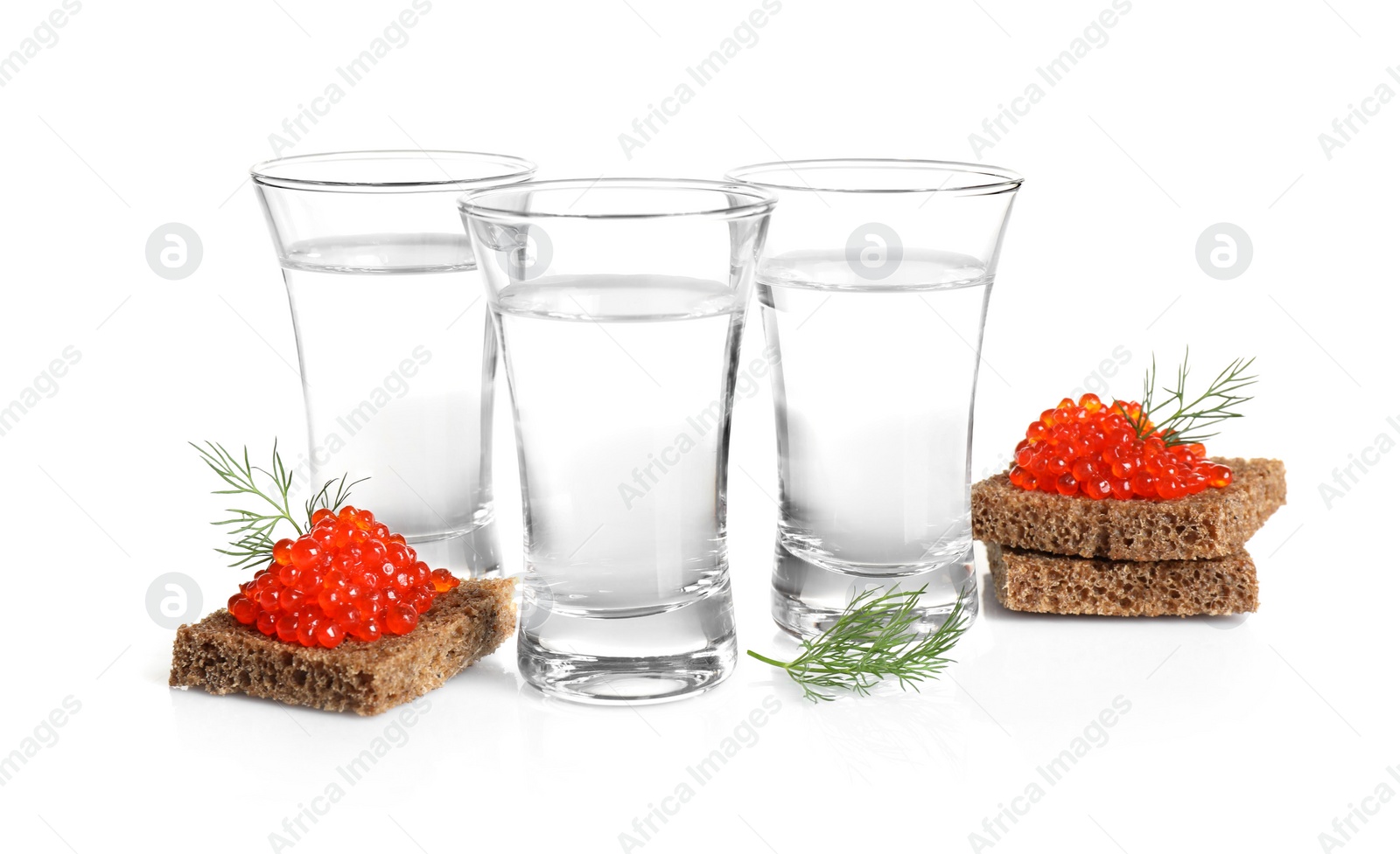 Photo of Russian vodka and red caviar sandwiches isolated on white